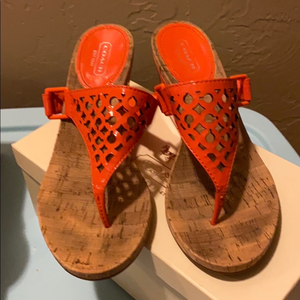 Dressy orange Coach wedge